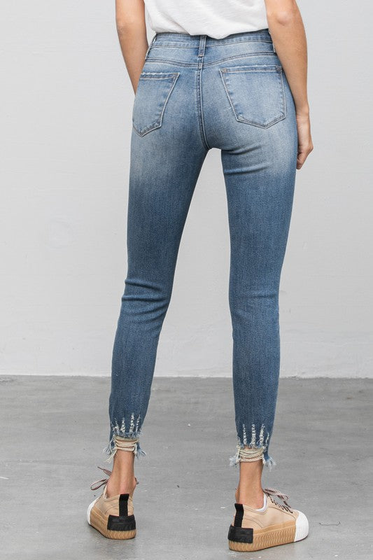 HIGH STRETCH MID RISE SKINNY JEANS